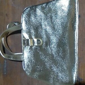 ⭐️ Gold tone makeup bag with purple on inside